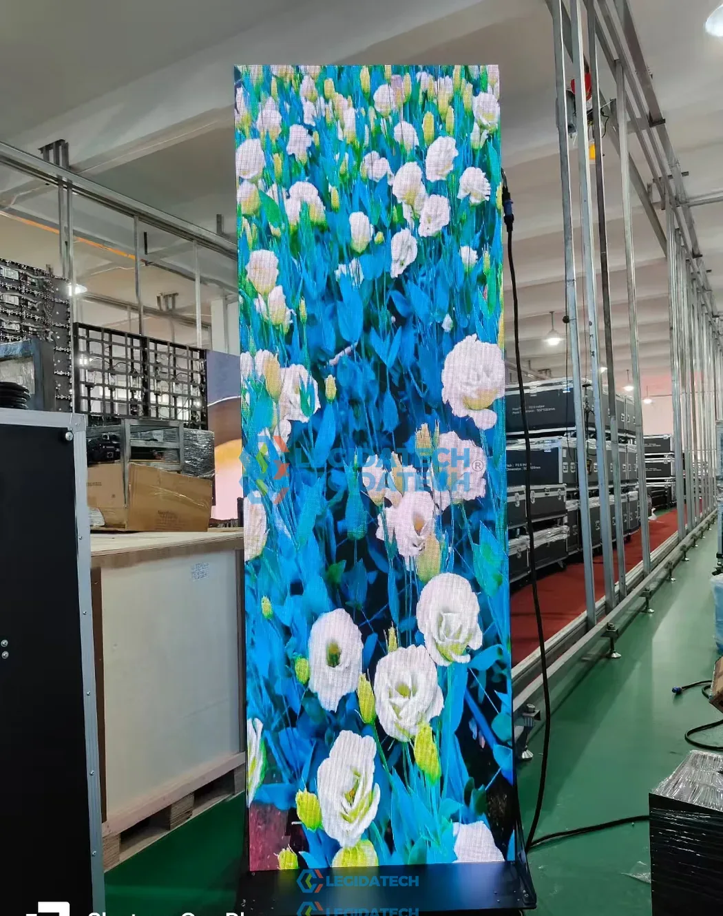 Foldable LED poster display for church - 640x1920mm portable LED screen lit up showing colorful content